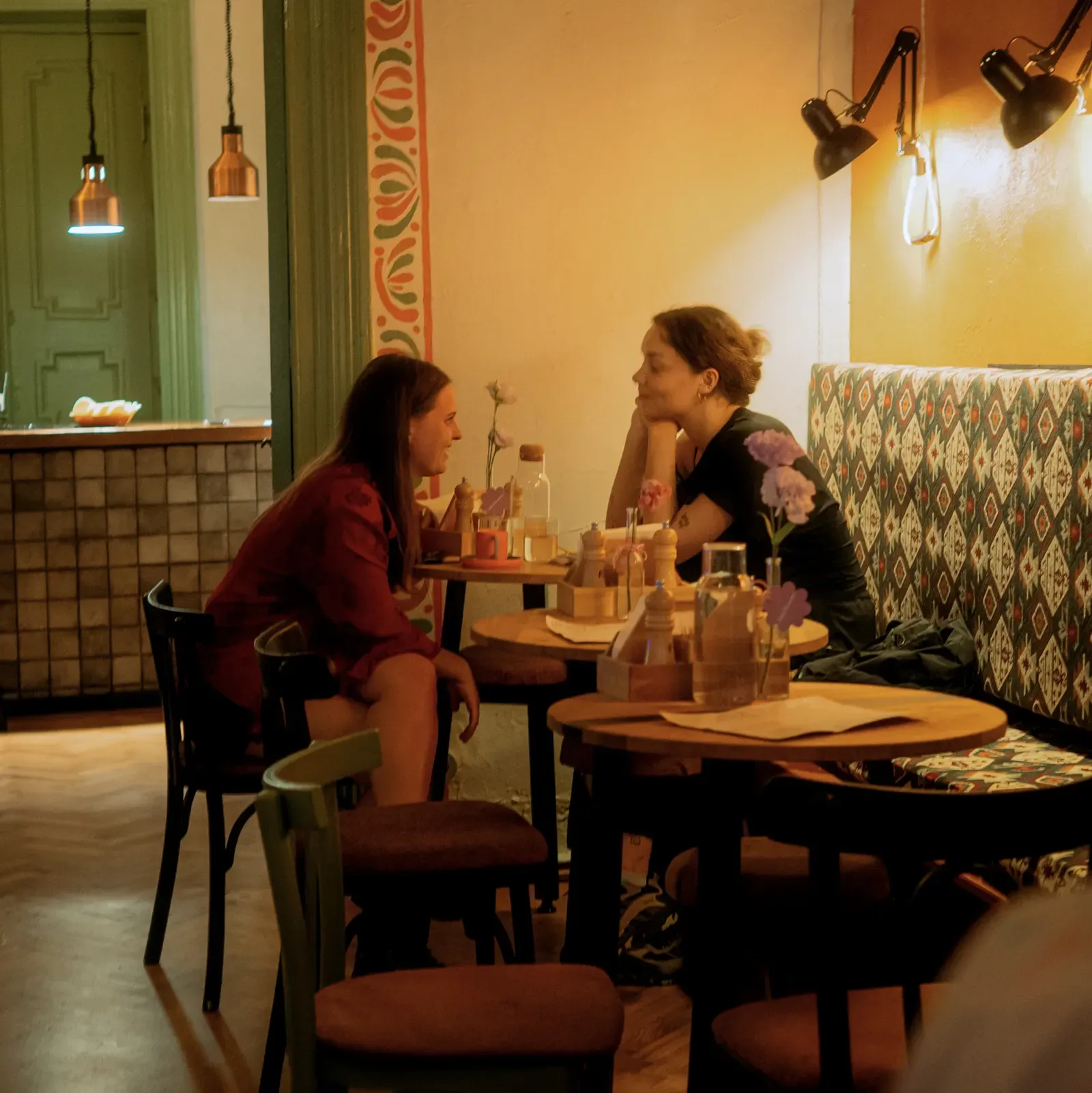Guests mid-conversation at the table